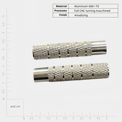 Ręczniki i guziki z aluminiowego stopu z ciemnymi otworami